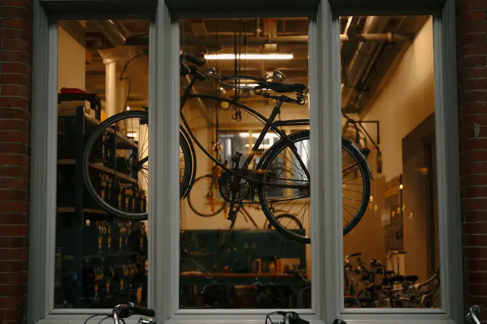 A curated display of bicycles and parts in our workshop